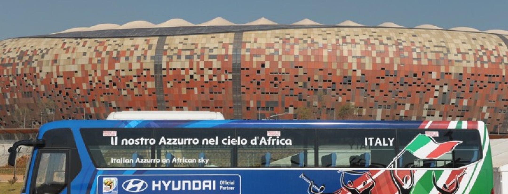 Italy's slogan, "Let's paint the FIFA World Cup dream blue," on the national team bus