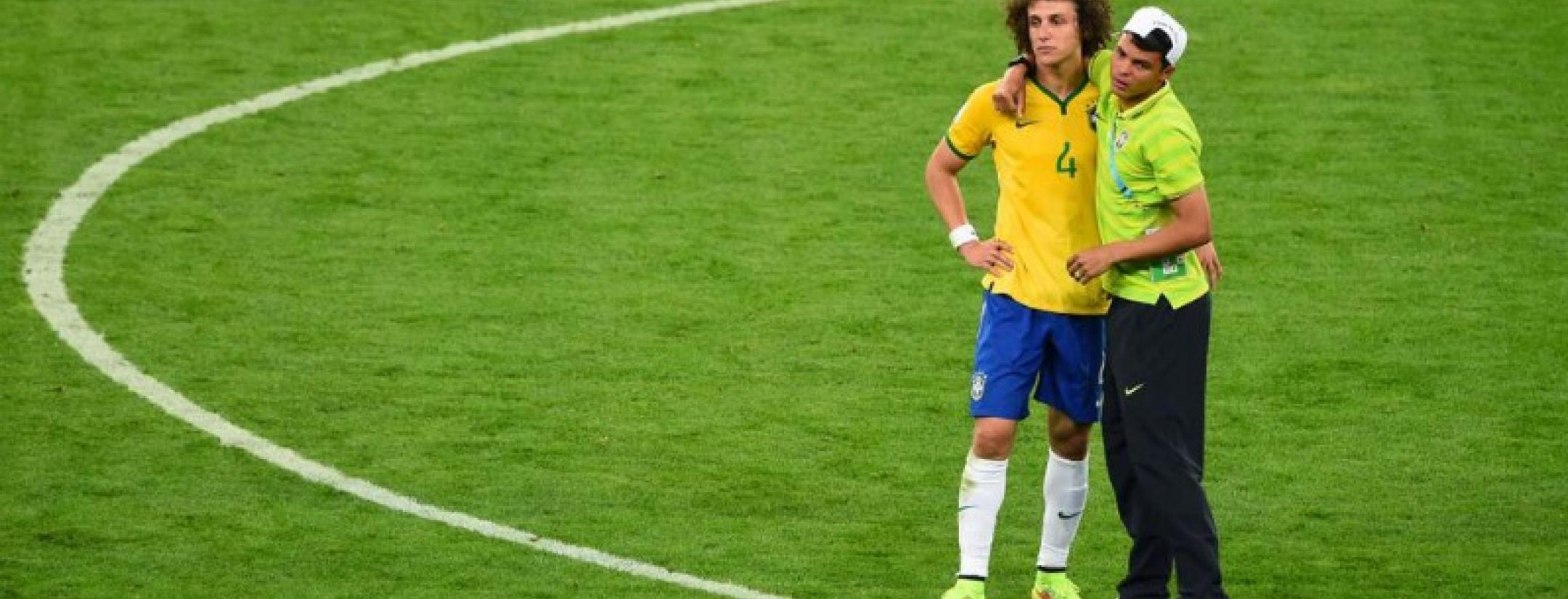 Thiago Silva, who did not play in Brazil's match versus Germany, comforts David Luiz after the crushing defeat