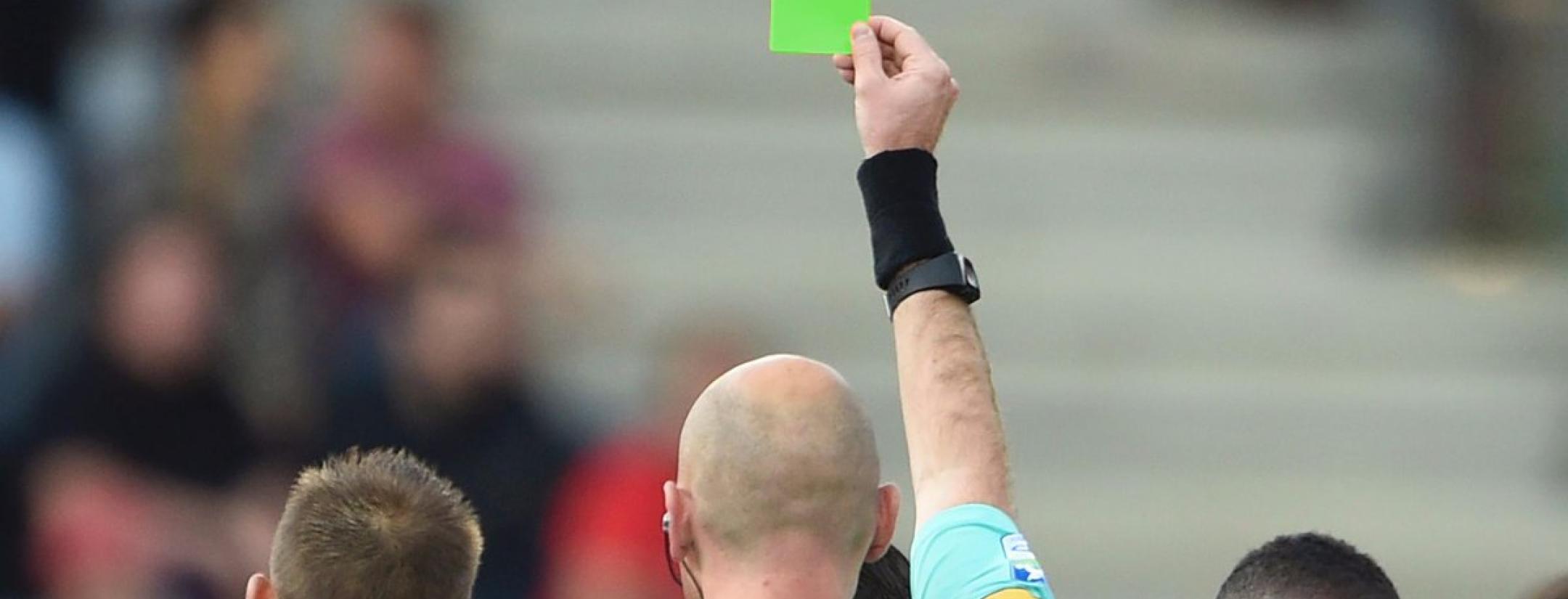 The first green card in soccer.