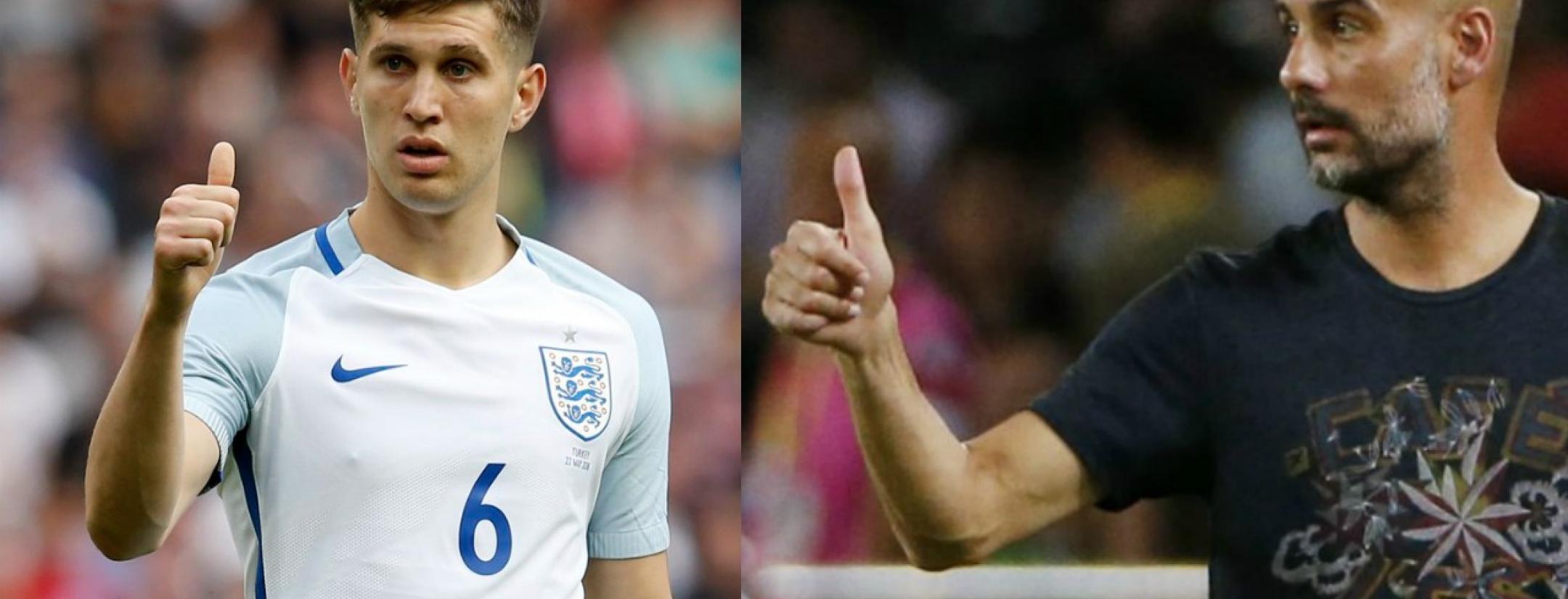 Pep Guardiola and John Stones