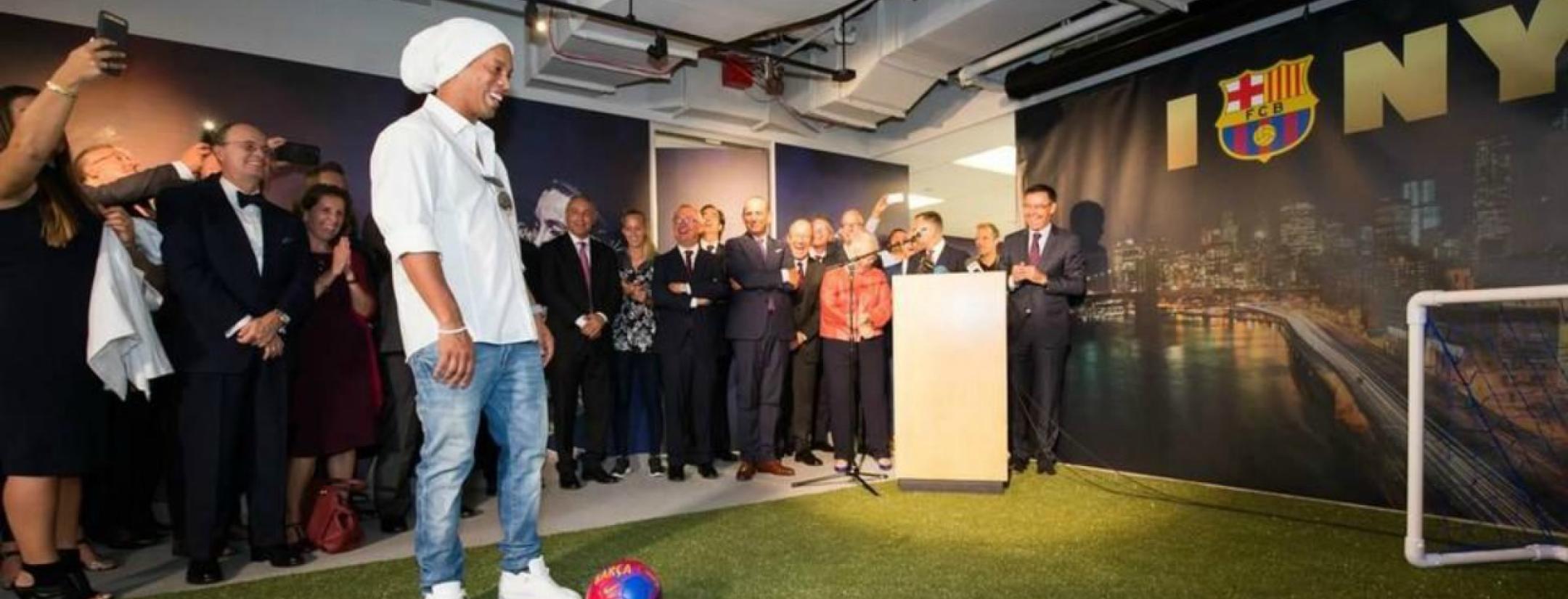 Ronaldinho helps to open Barca's NYC office.