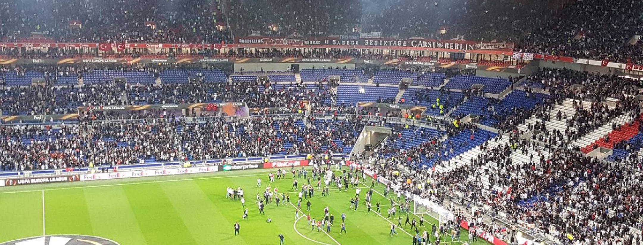 Fans invade the pitch