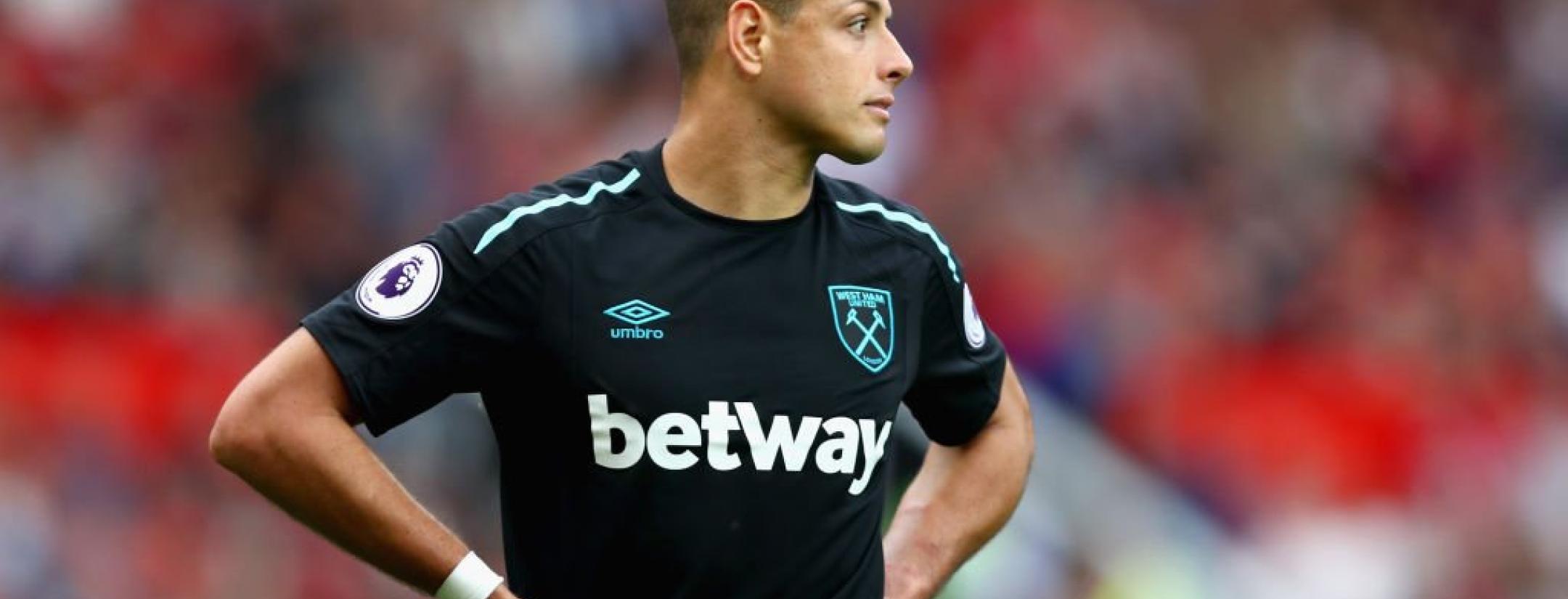 Chicharito stands, looking disappointed during his West Ham debut