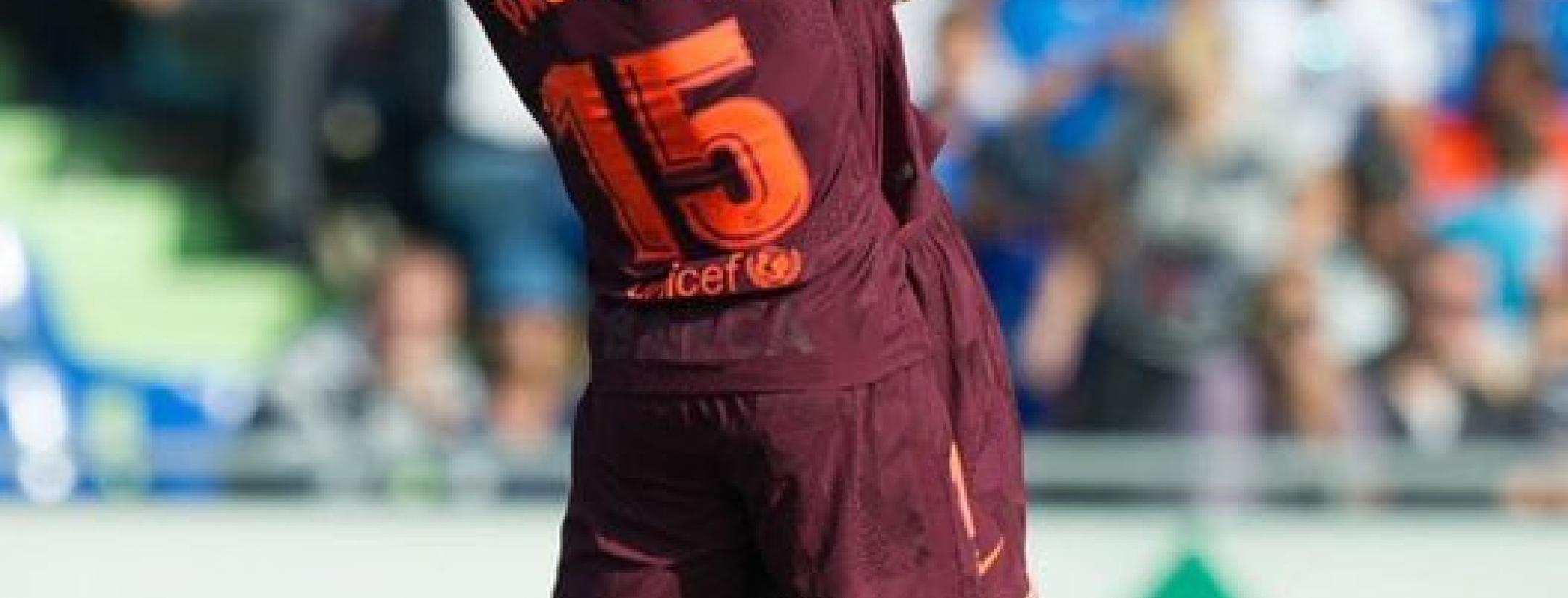 Paulinho and Lionel Messi