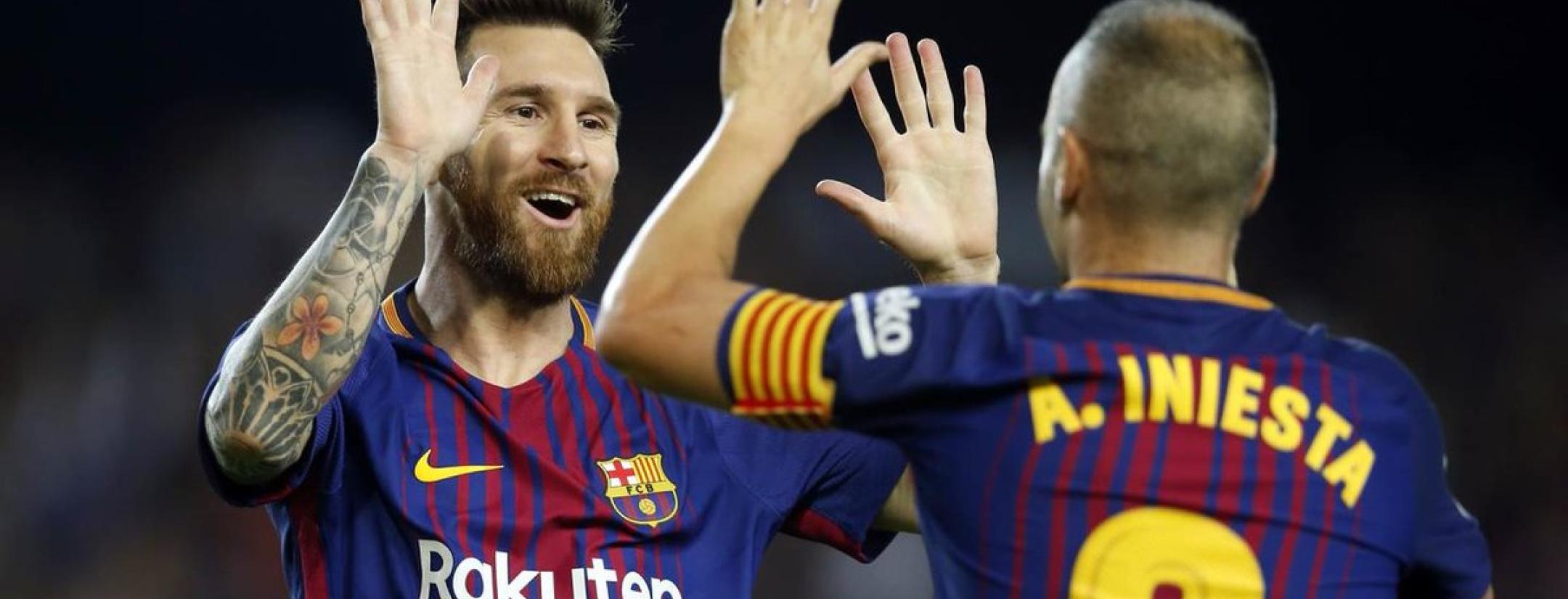 Messi and Iniesta passing