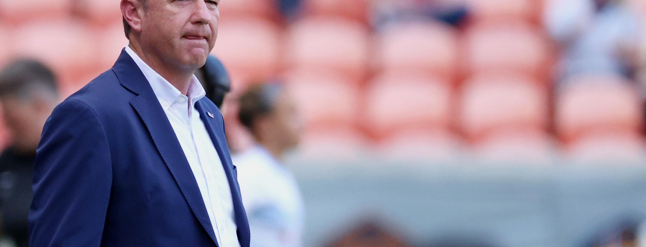 What Did Houston Dash Coach Do