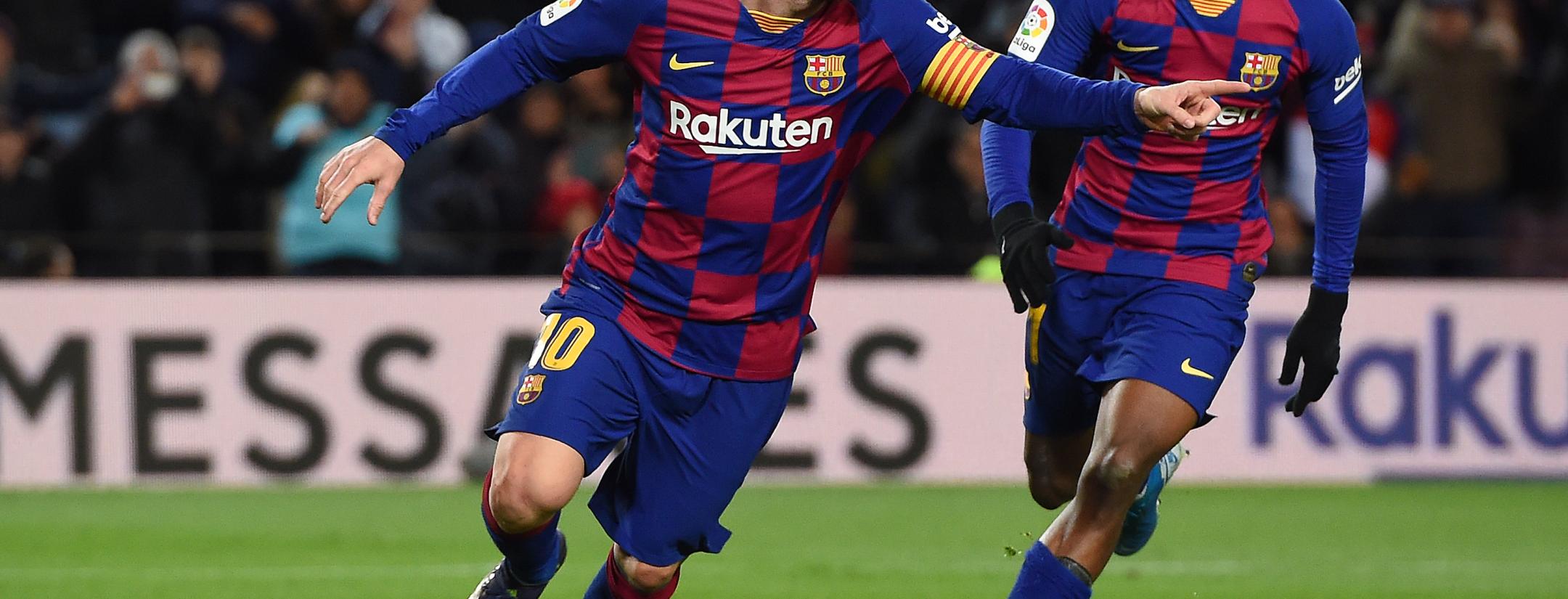 Lionel Messi celebrates his goal vs. Granada