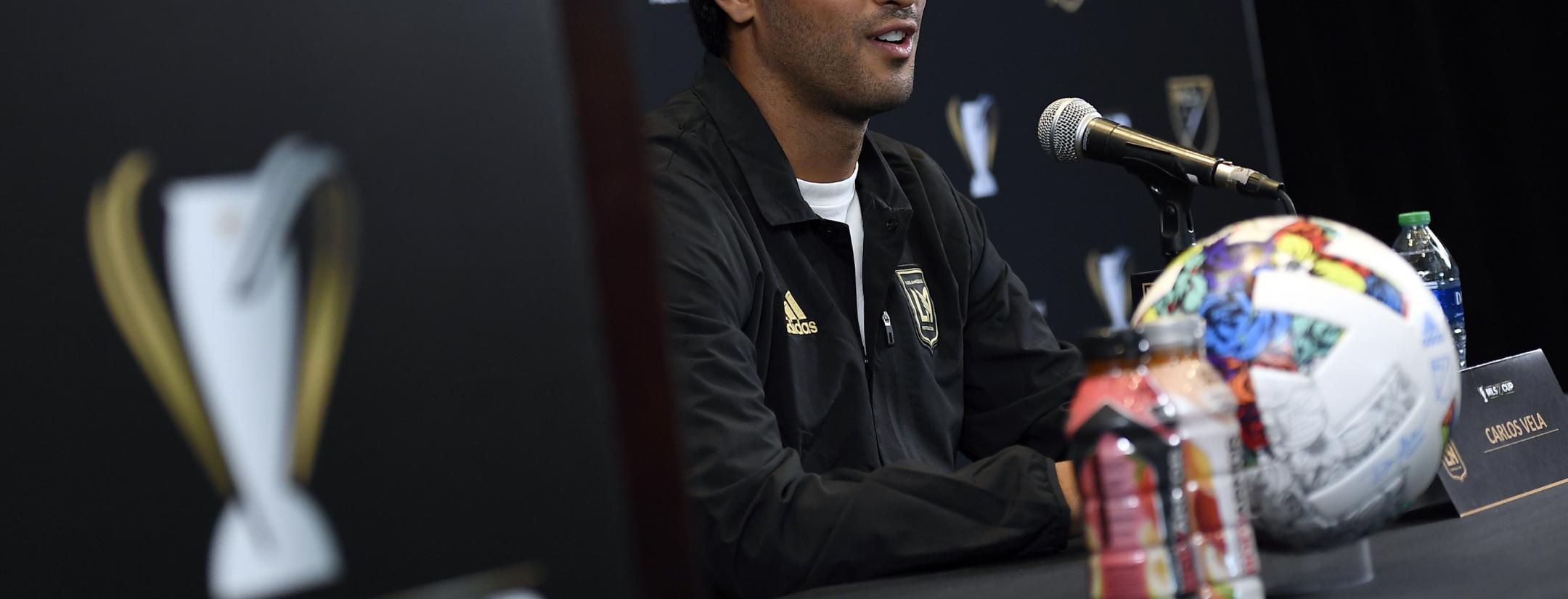 Why does Carlos Vela not play for Mexico?