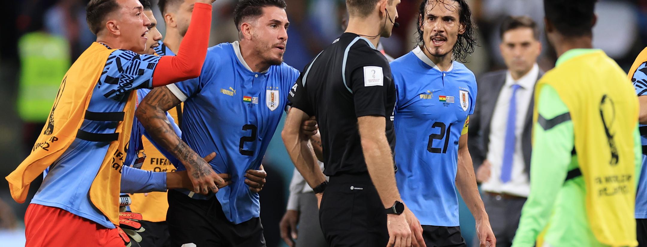 Uruguayan players chase down referee after World Cup exit.