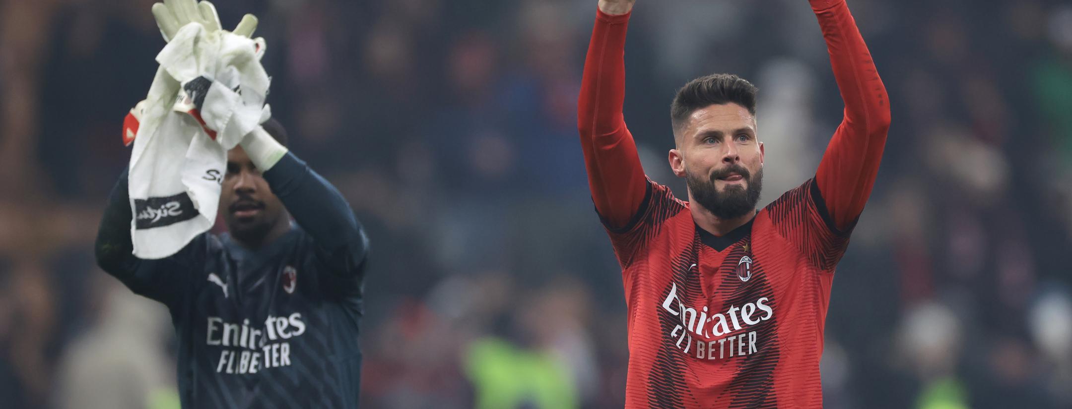 Olivier Giroud salutes fans at San Siro