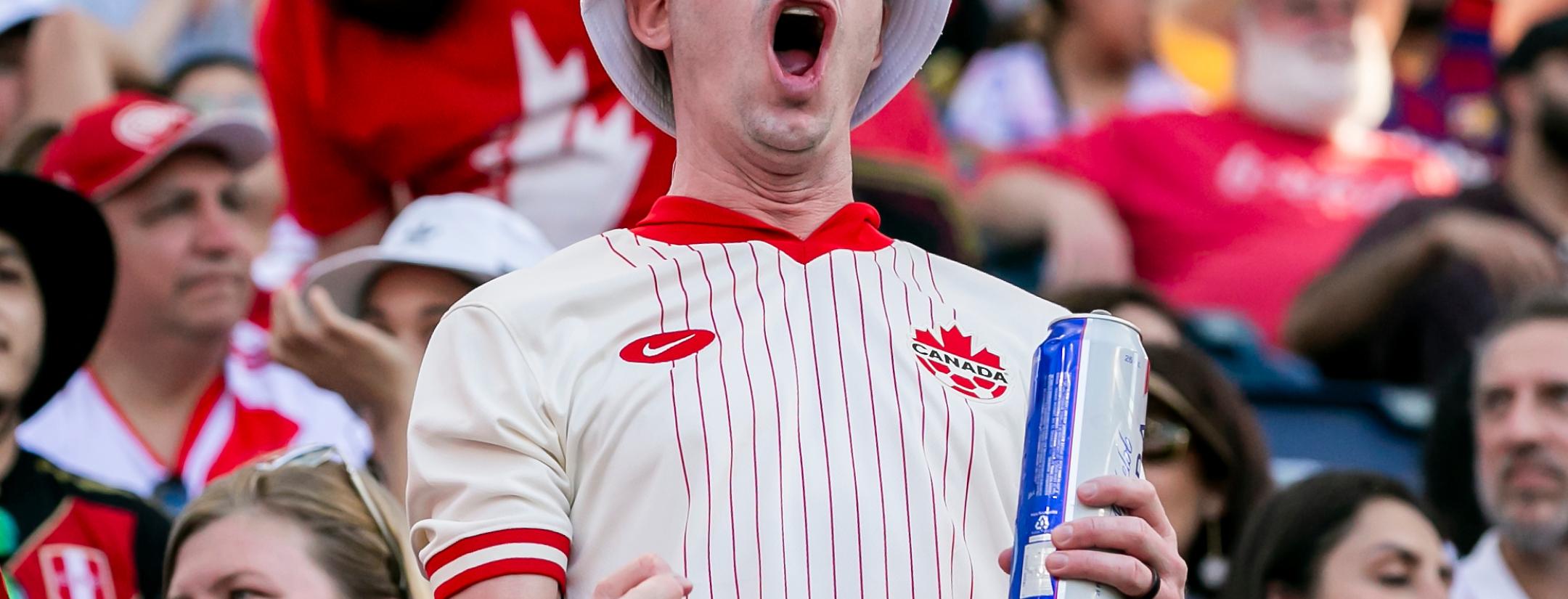 A Canada fan celebrates a goal during the COPA America group A match between Canada and Peru on Tuesday June 25, 2024 at Children's Mercy Park in Kansas City, KS.