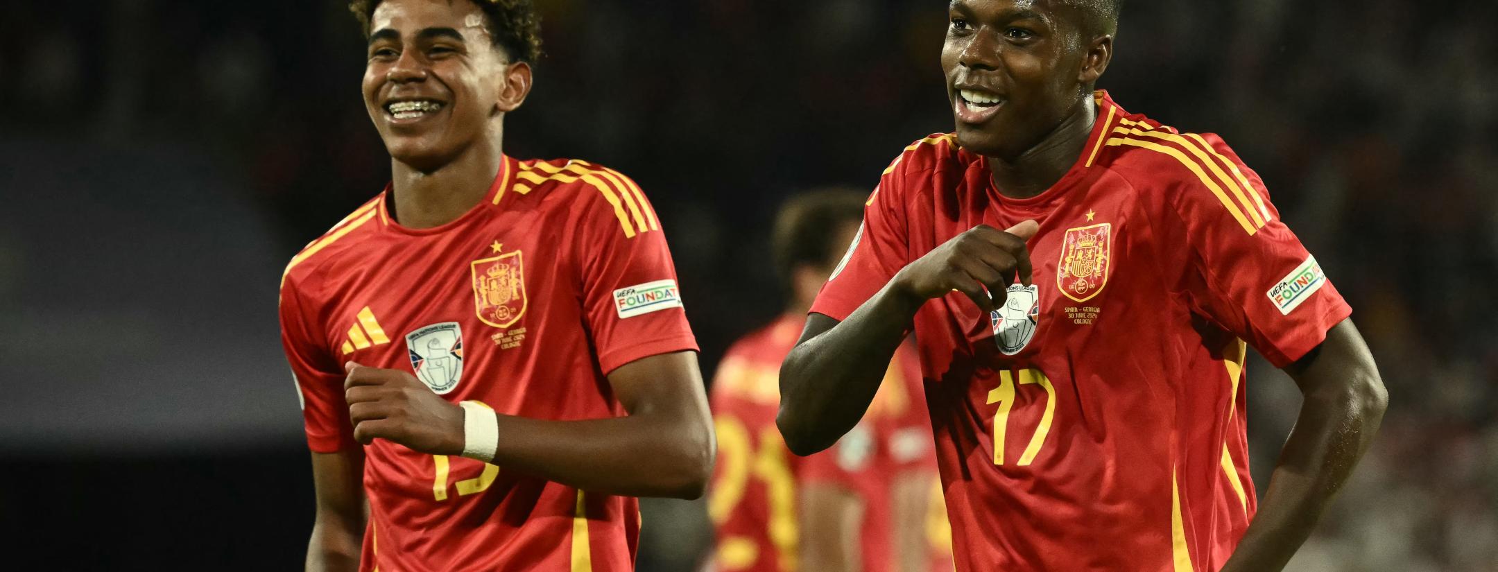 Nico Williams celebrates scoring his team's third goal with his teammates including Spain's forward #19 Lamine Yamal during the UEFA Euro 2024 round of 16 football match between Spain and Georgia