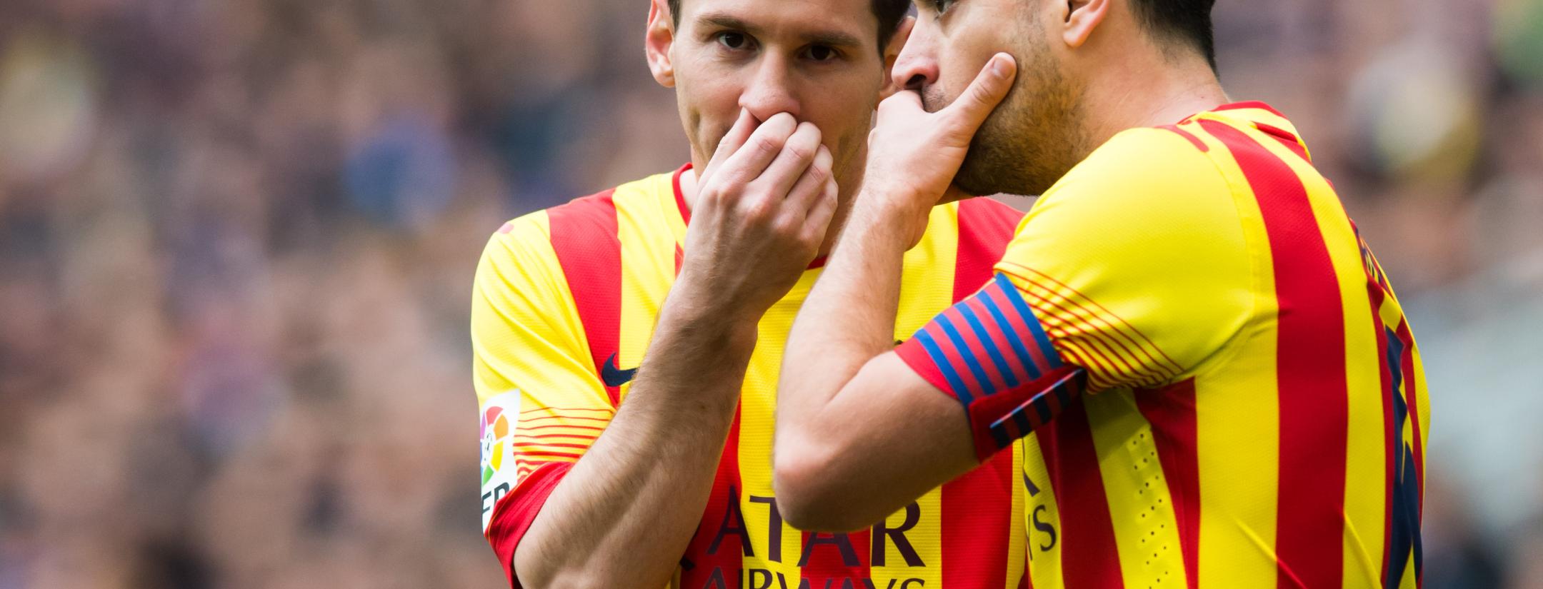 Lionel Messi and Xavi
