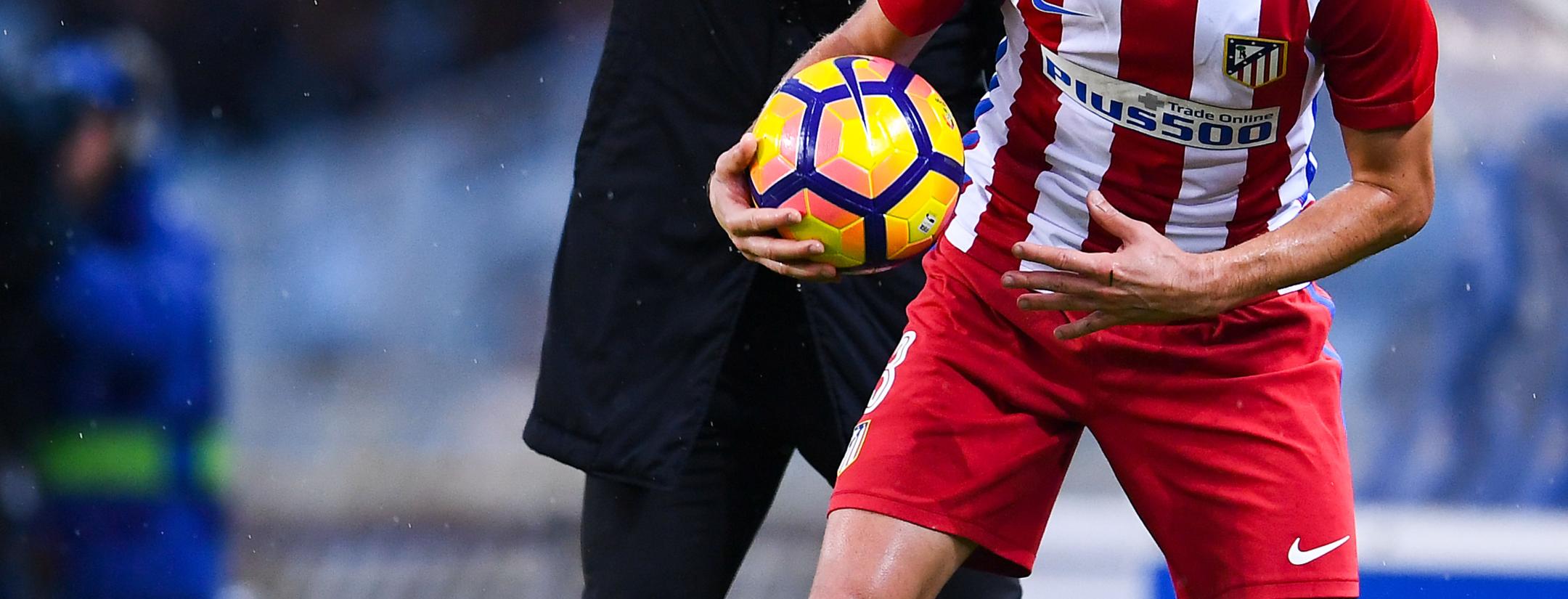 Filipe Luís and Diego Simeone