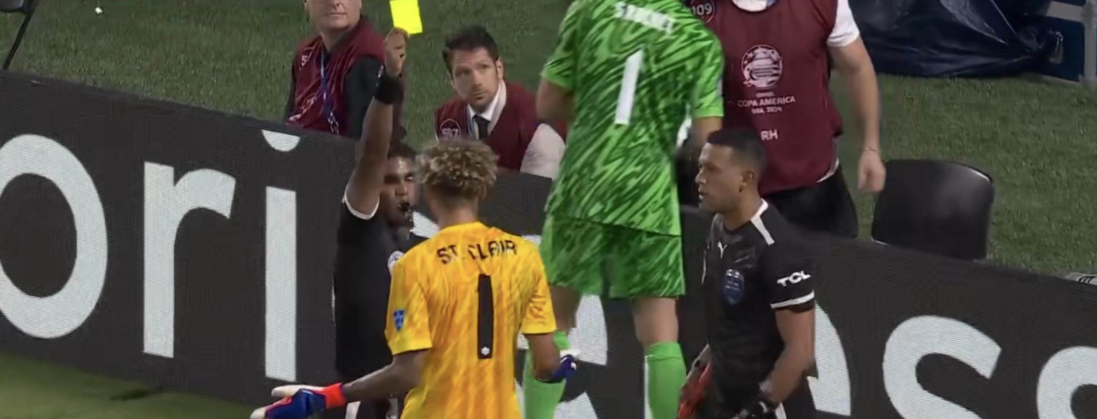 Dayne St. Clair yellow card for hiding Uruguay keeper penalty notes