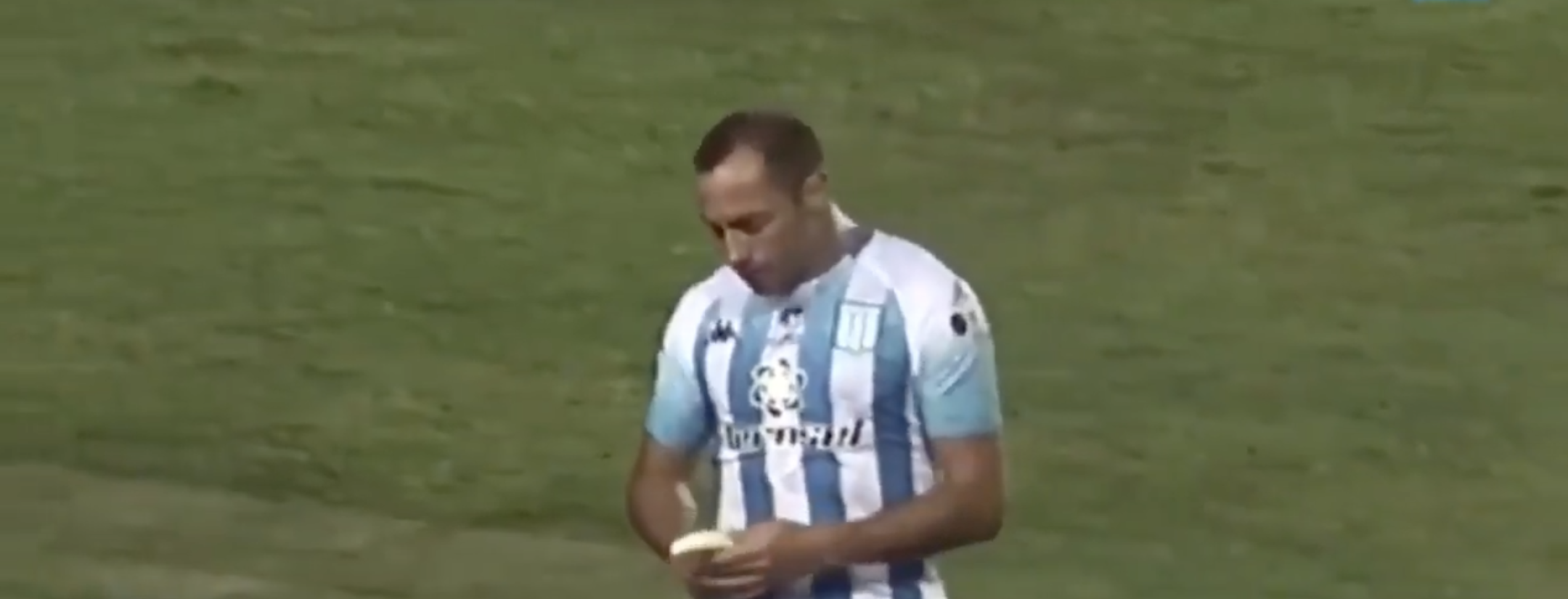 Soccer player eats banana