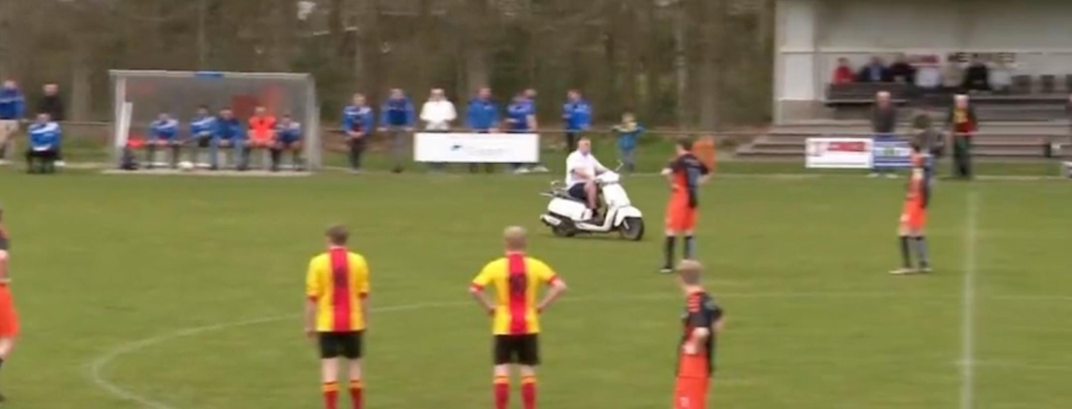 Man on scooter stops soccer game