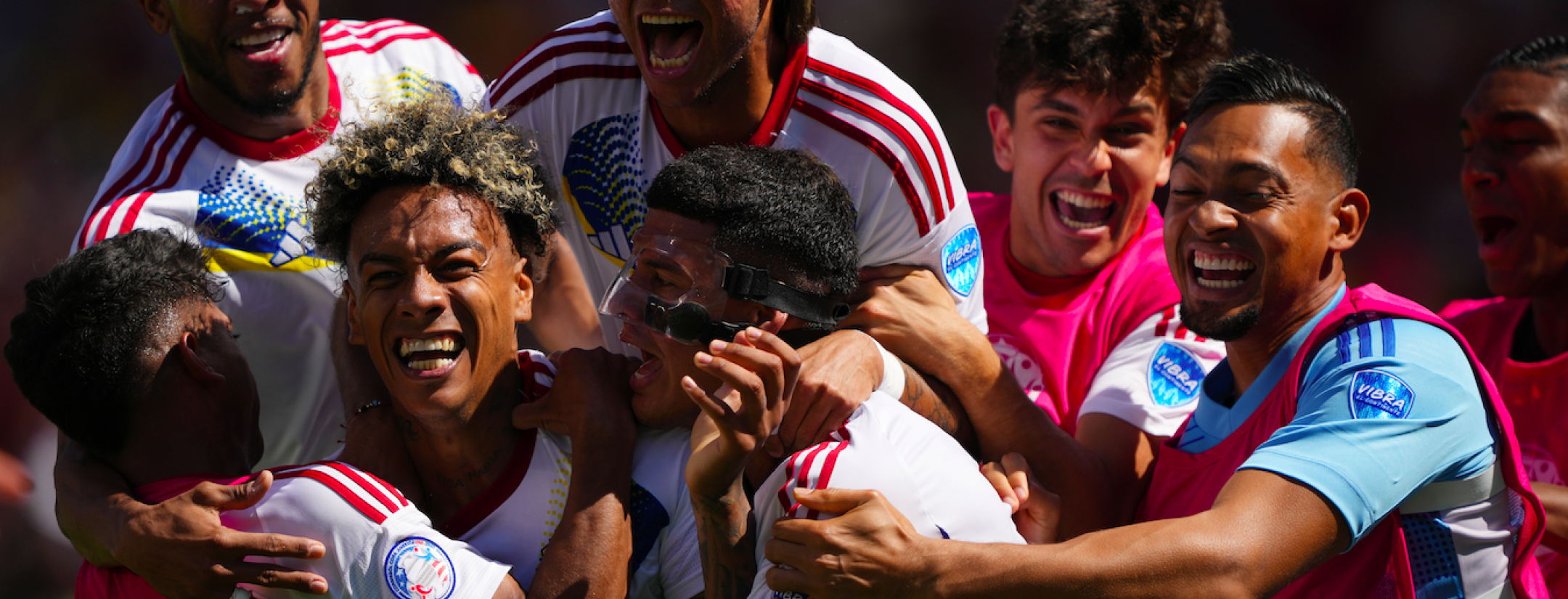 Jhonder Cadiz of Venezuela celebrates with teammates after scoring against Ecuador in 2024 Copa América