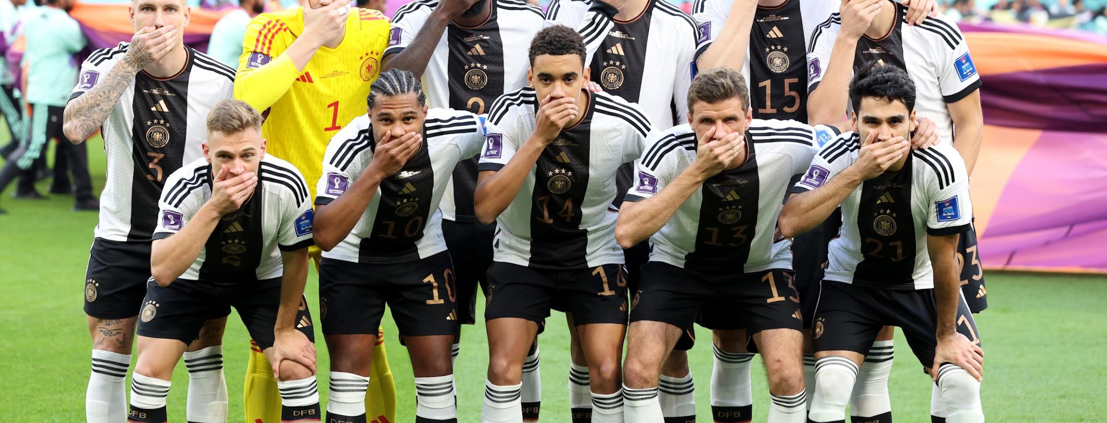 Germany Players Cover Mouths Before Japan Game