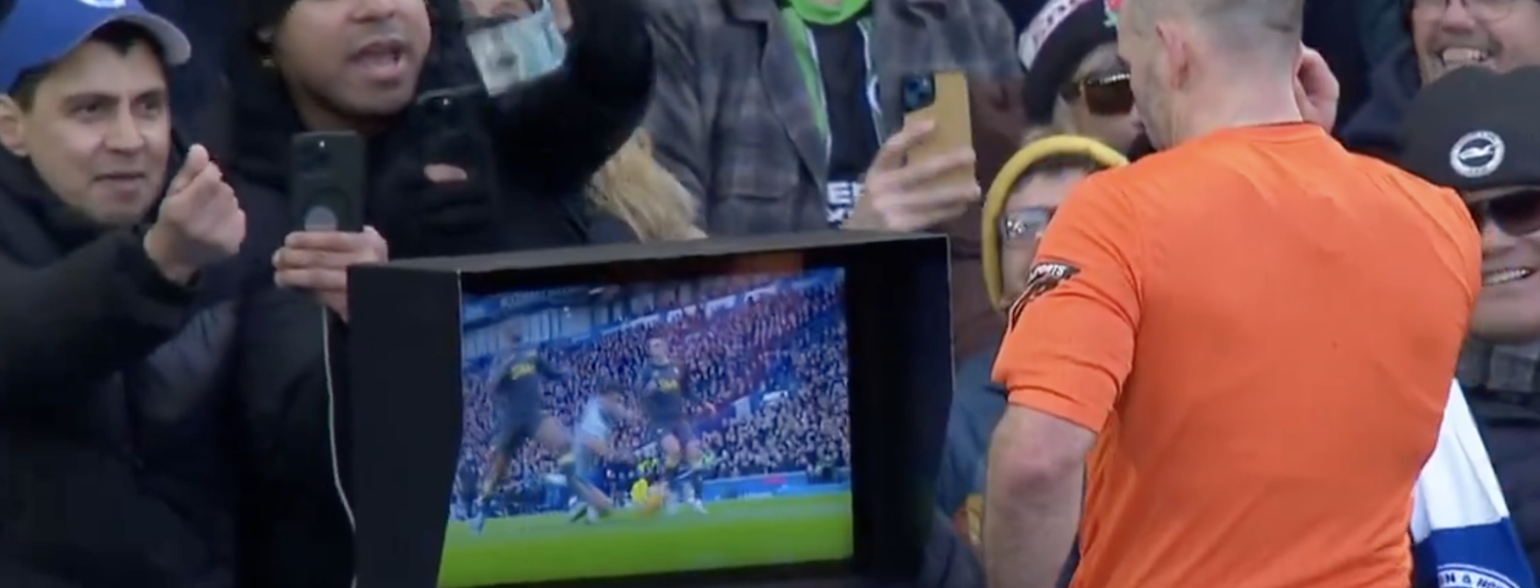 Brighton fan waves money