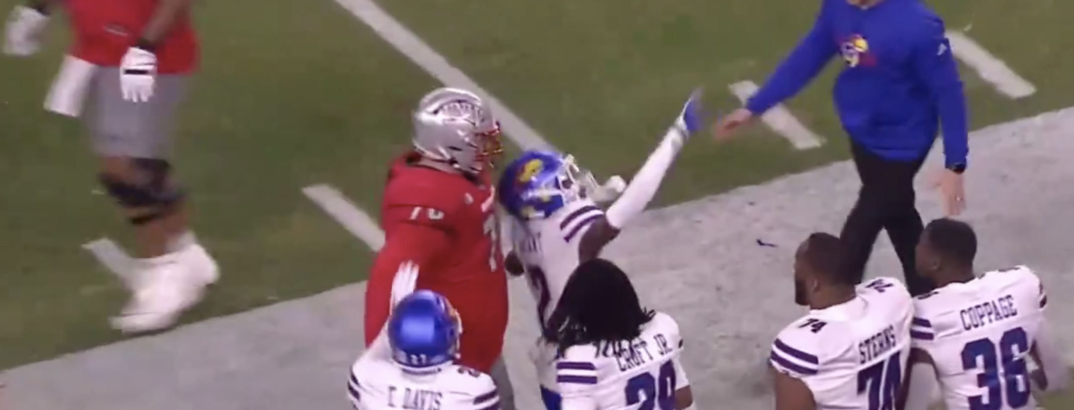 Kansas football player flops