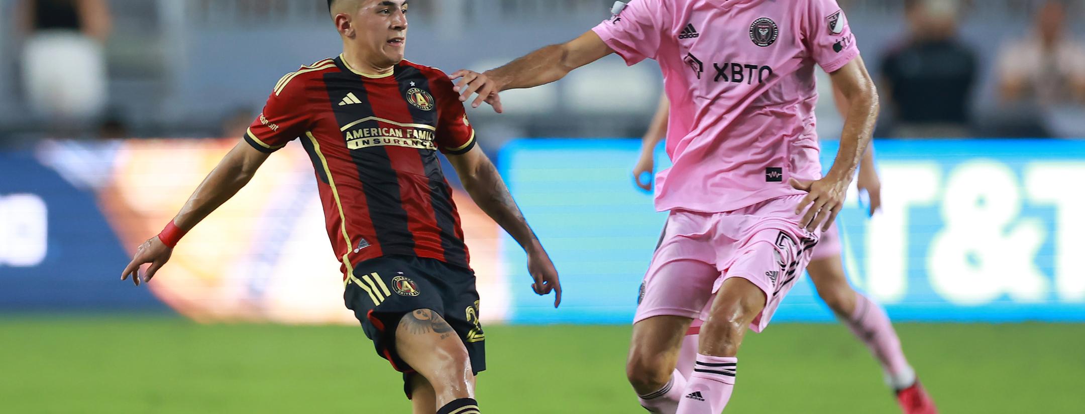 Thiago Almada and Sergio Busquets