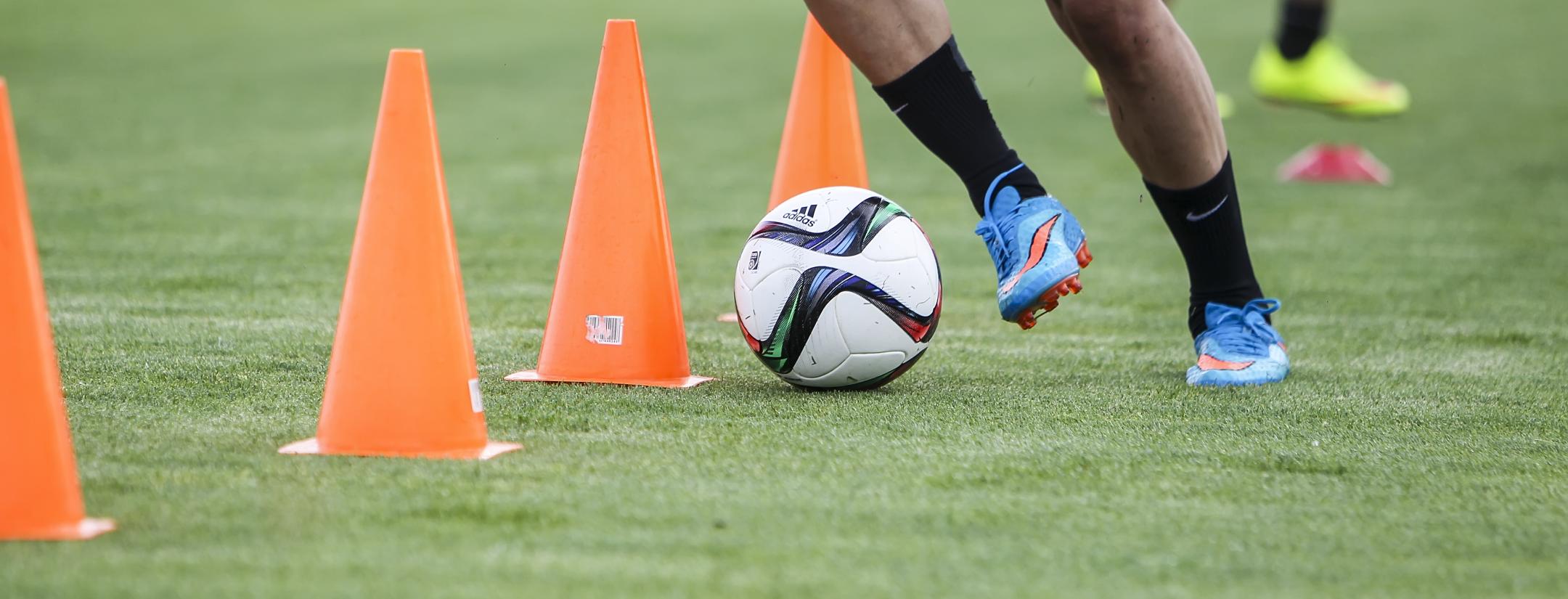 How do soccer players train