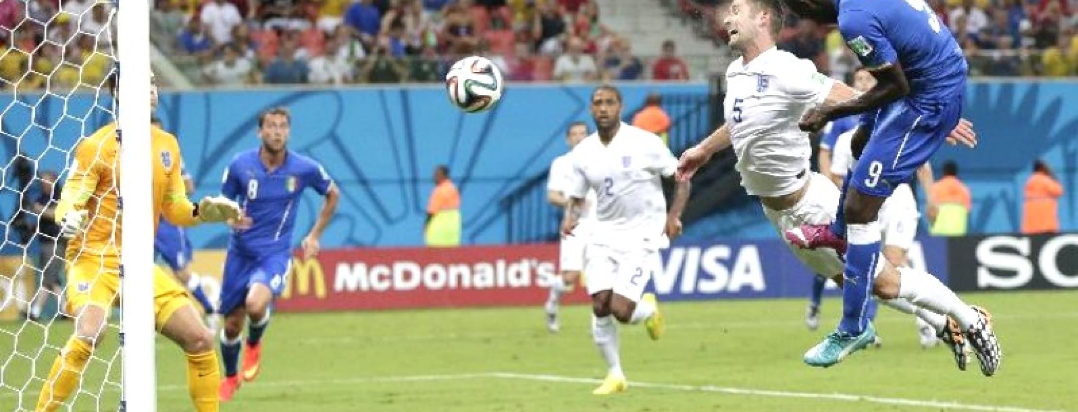Mario Balotelli finds the corner of the net with a header