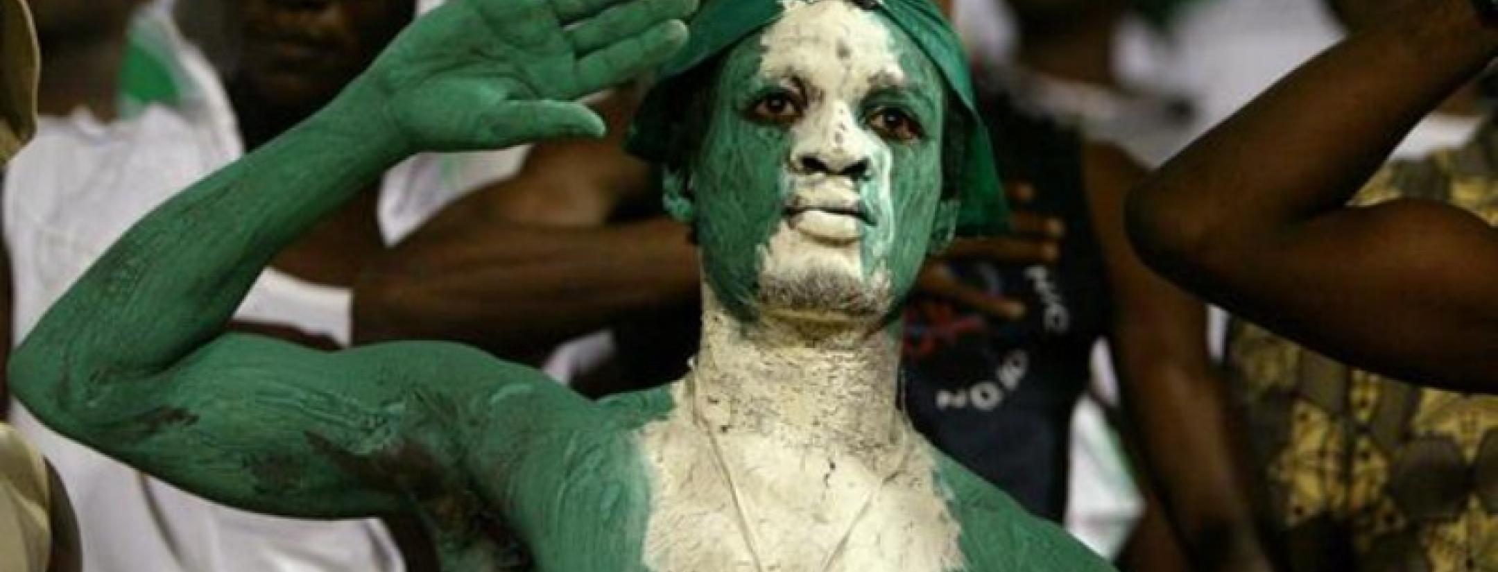 Nigerian fan saluting the national team