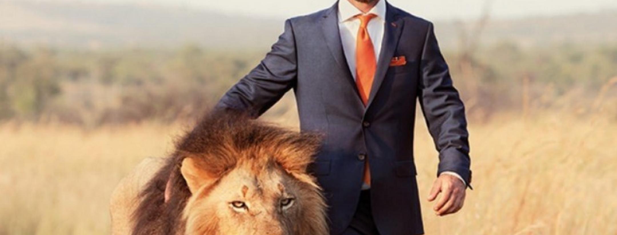 Kevin Richardson plays soccer with lions 