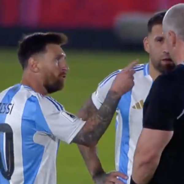 Messi arguing with referees