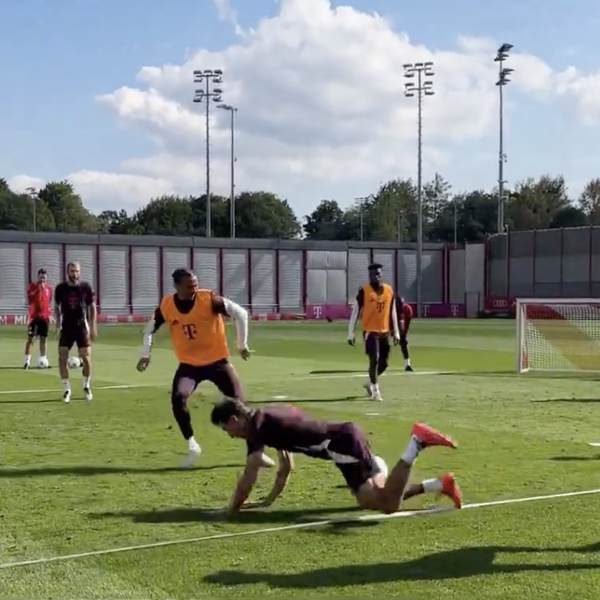 Thomas Muller trips during Bayern training