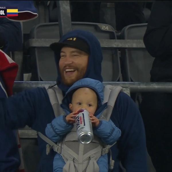 Viral baby holding Truly can in USWNT match against Colombia