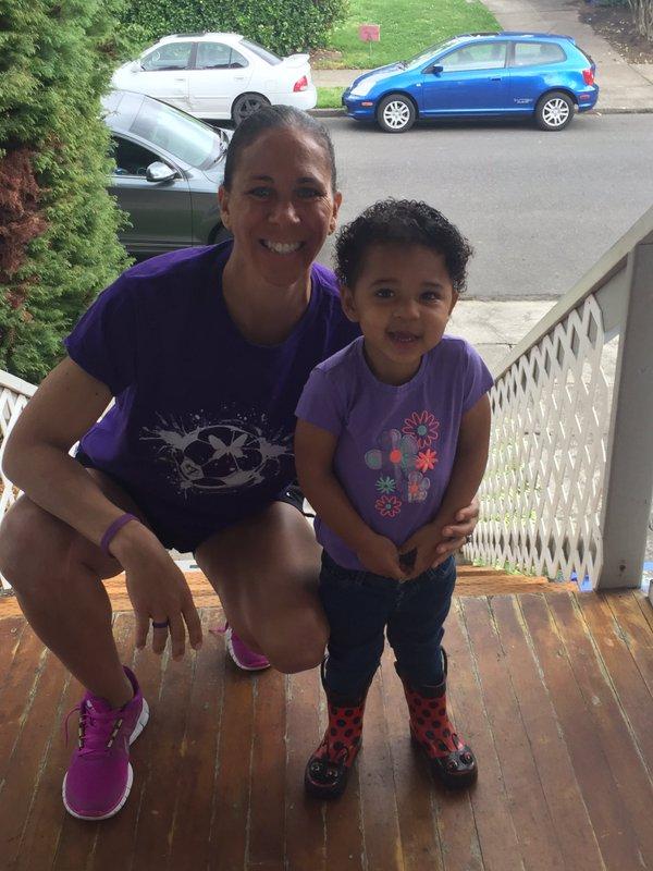Shannon Boxx and daughter match in purple.