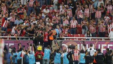 Chivas fans celebrate with Nene Beltrán