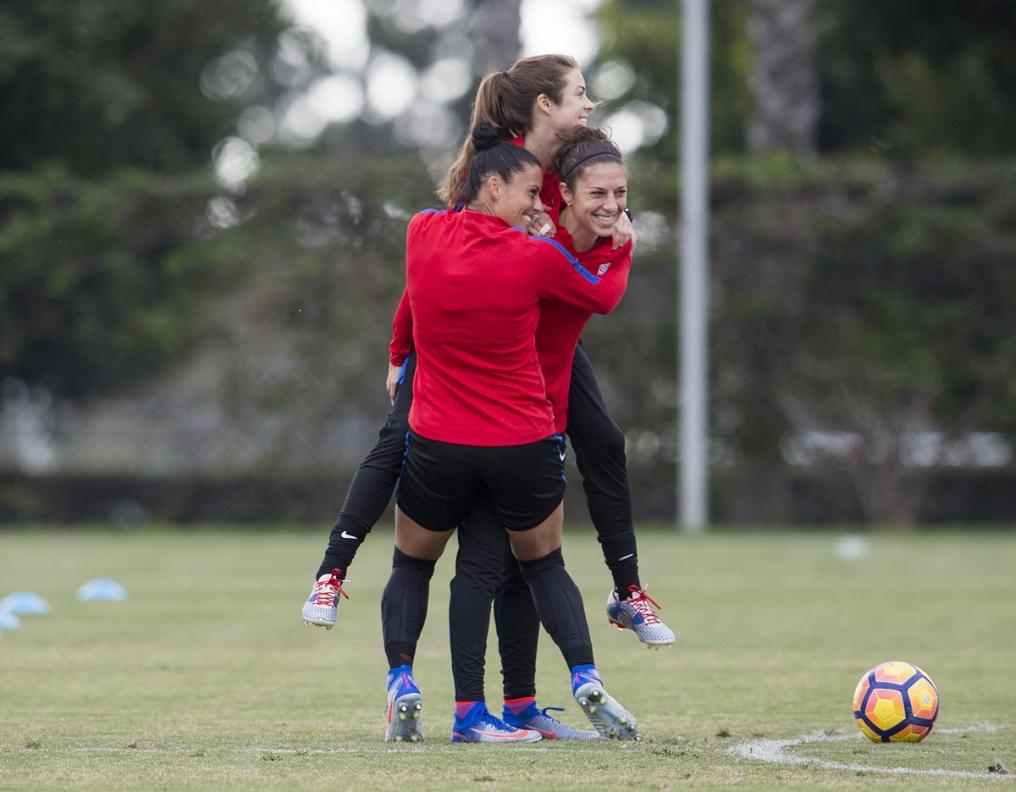 USWNT players smile during their annual training camp