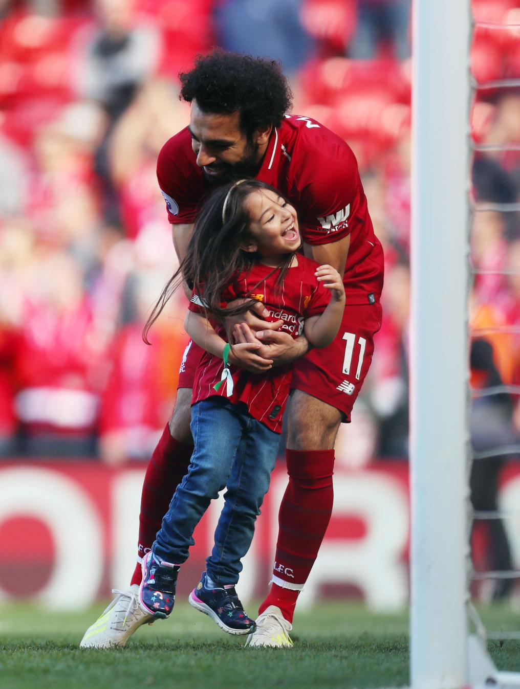 Mo Salah and his daughter after a match