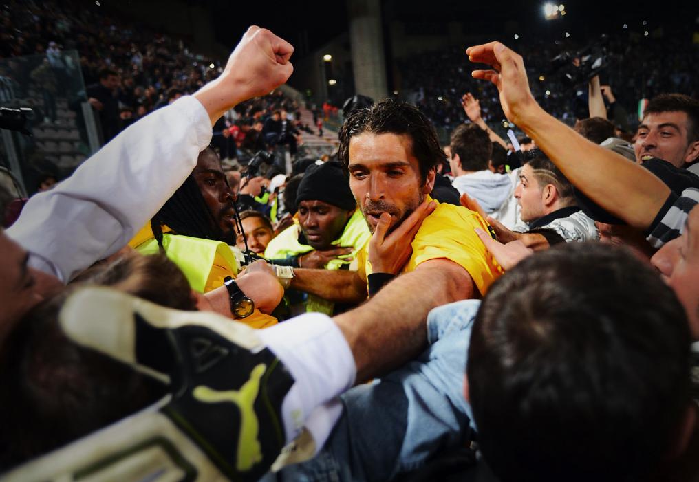 Gigi Buffon greets the fans after a match against Cagliari.