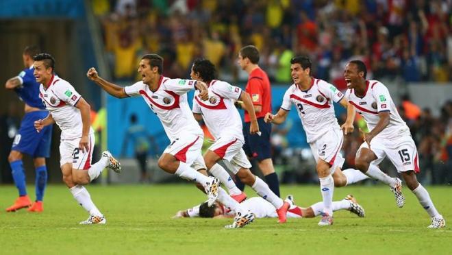 The Costa Rican soccer team celebrates their advancement on penalty kicks.