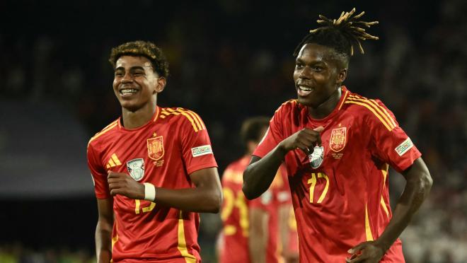 Nico Williams celebrates scoring his team's third goal with his teammates including Spain's forward #19 Lamine Yamal during the UEFA Euro 2024 round of 16 football match between Spain and Georgia