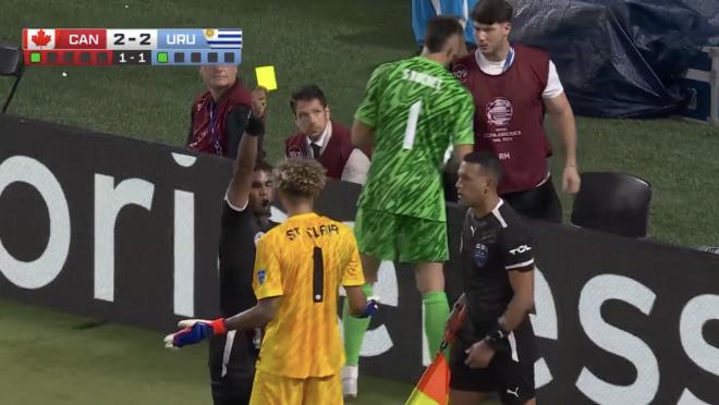 Dayne St. Clair yellow card for hiding Uruguay keeper penalty notes