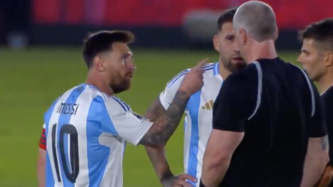 Messi arguing with referees