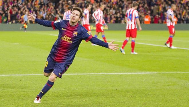 Barcelona's Lionel Messi celebrates a goal against Atletico Madrid in prior action
