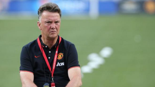 Van Gaal sits with a stern expression