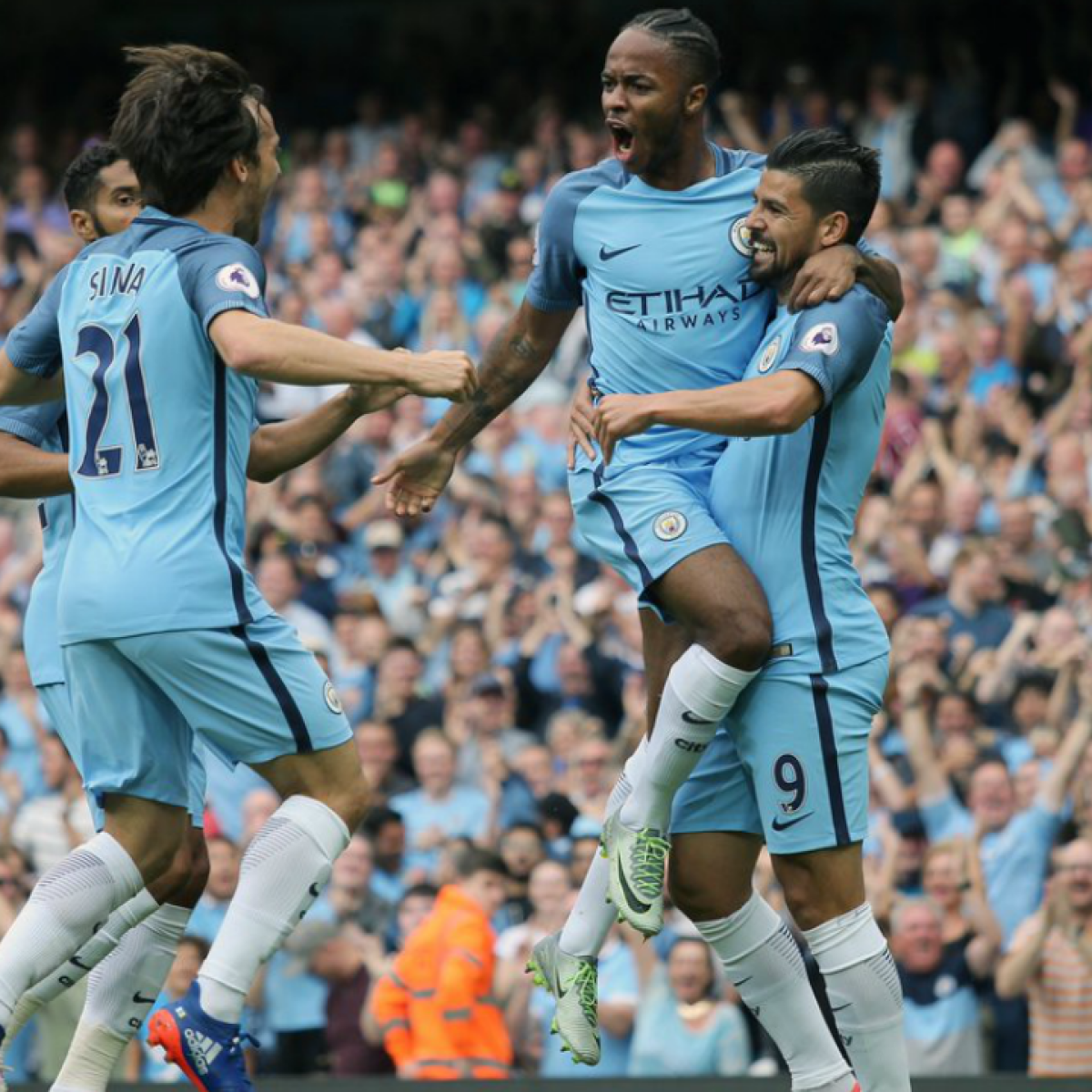 Raheem Sterling celebrates a Manchester City goal.