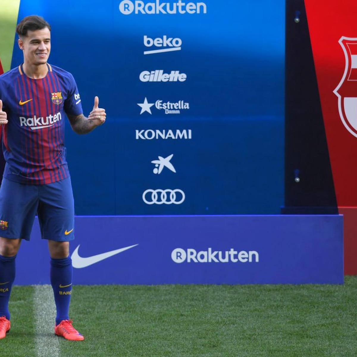 Coutinho happily gives a thumbs up in a fresh Barcelona uniform.
