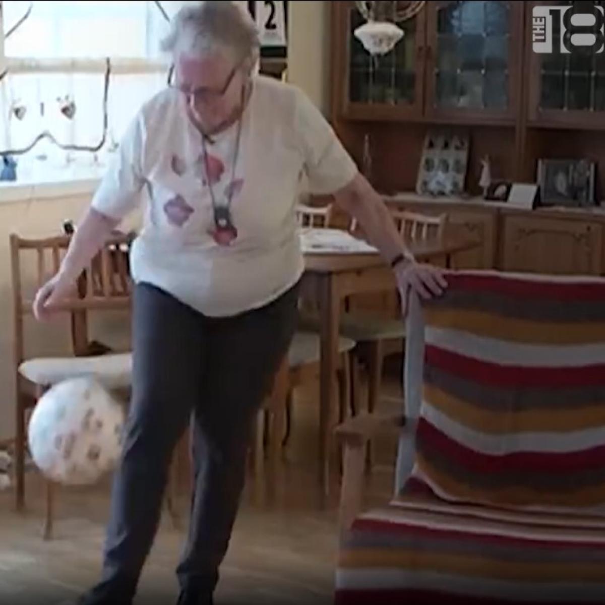 Grandma juggles a soccer ball