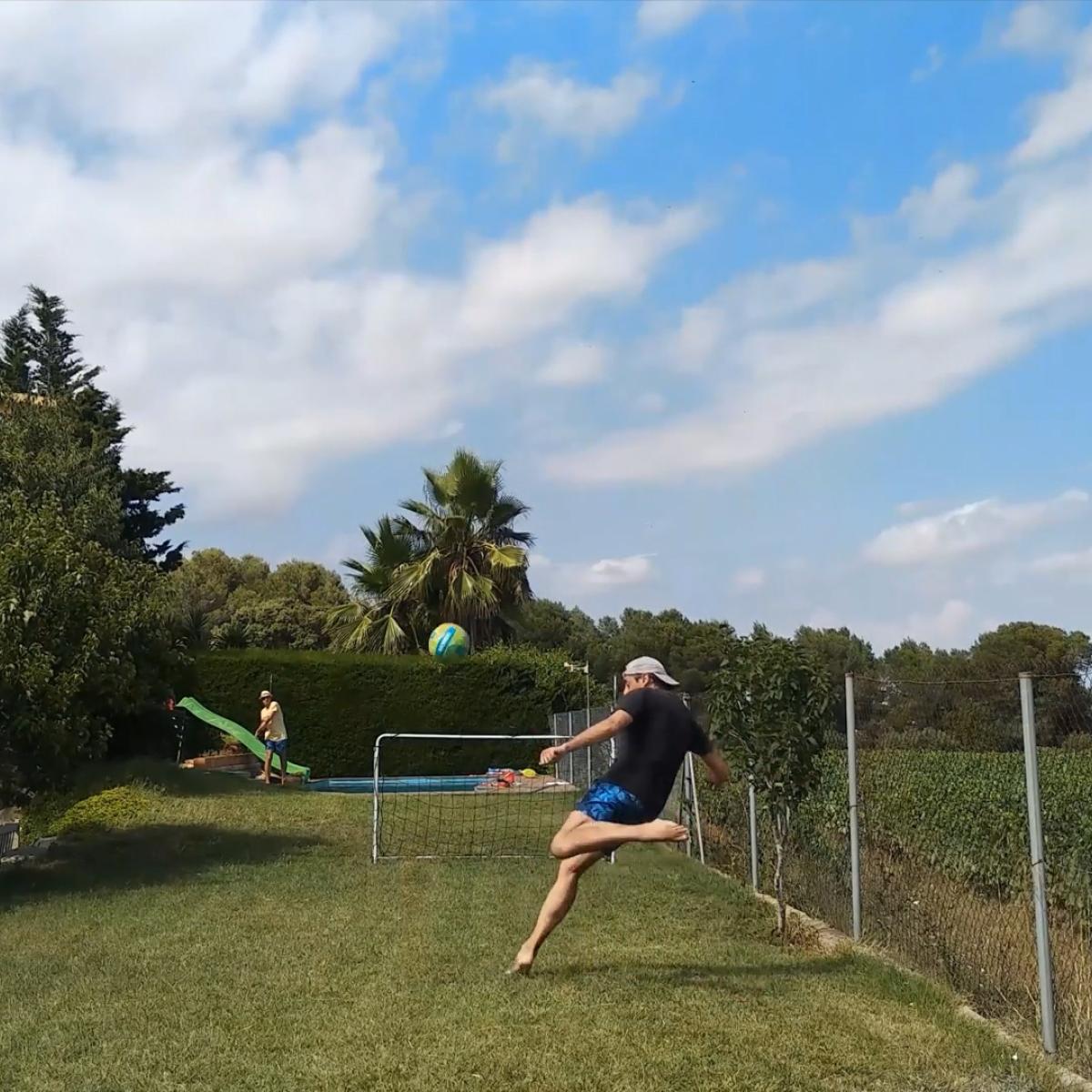 Guy takes shot on goal without looking