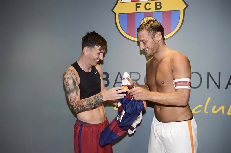 Lionel Messi and Francesco Totti