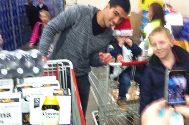 Luis Suarez at CostCo buying Corona